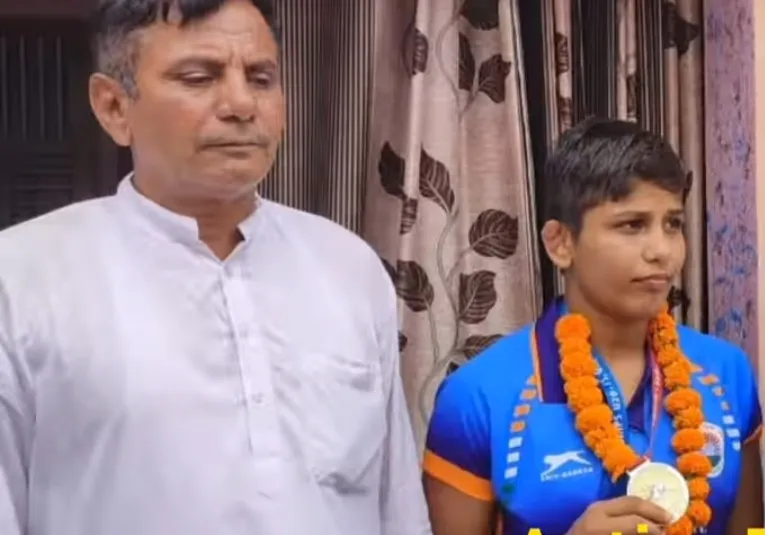 Antim Panghal with Father Ramnivaas Panghal