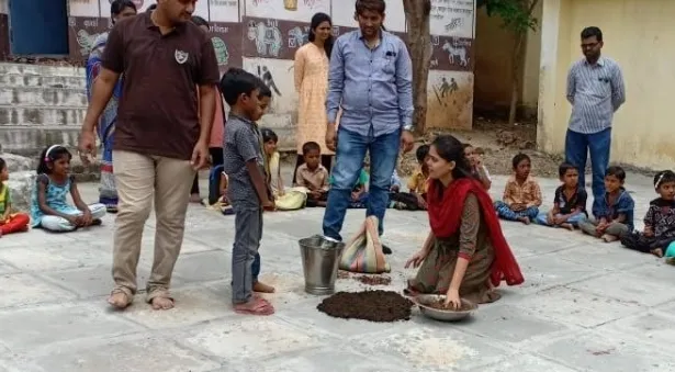 Aditi Patil teaching how to make seed ball