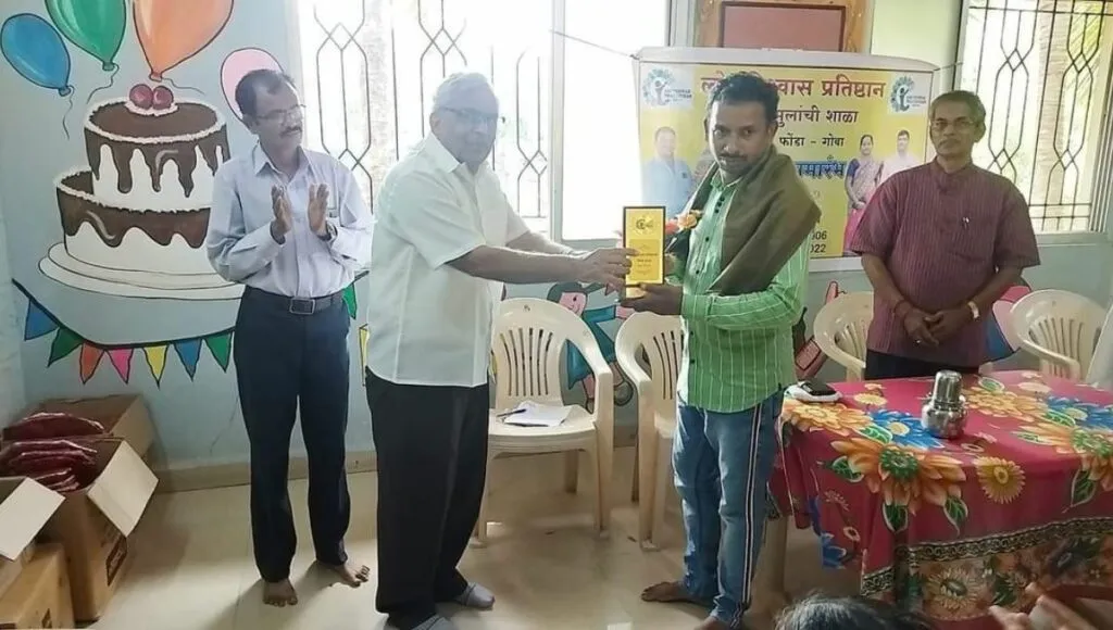Bipin Kadam while Receiving  one Award 