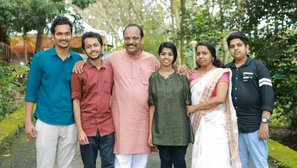Rajesh with his family helping needy 