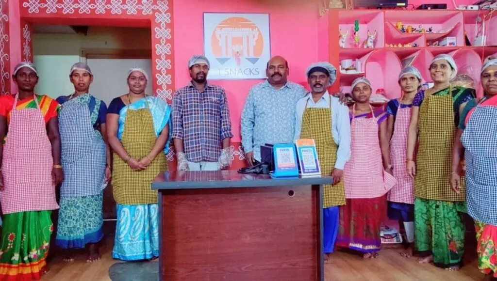 Rajendra Prasad along with his employees at his cloud kitchen.