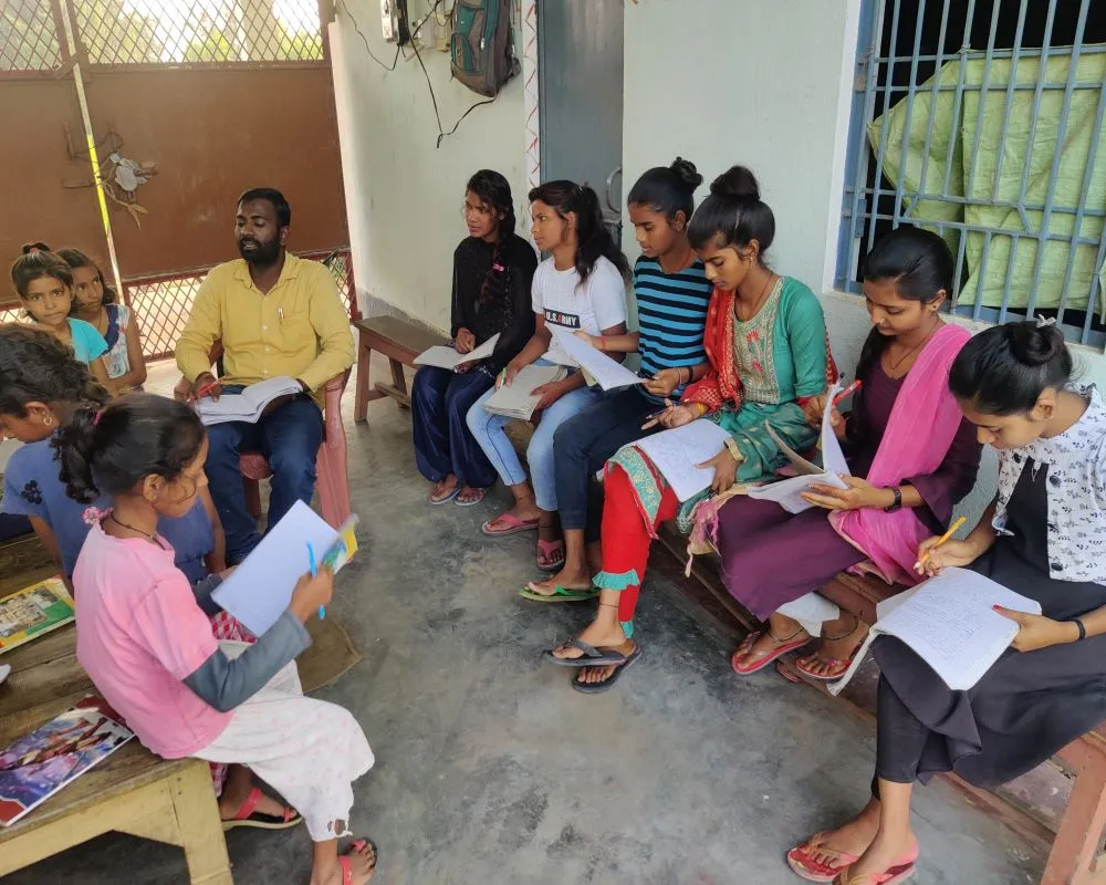 Brijesh teaching poor children 