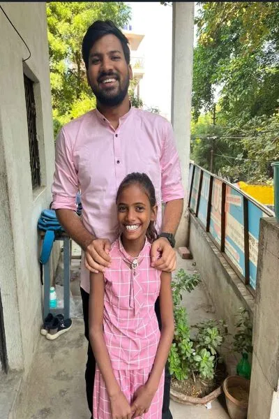 Uddeshya with one of the children who studies at Gurukulam