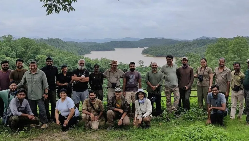 Happy guests with the staff after a safari.