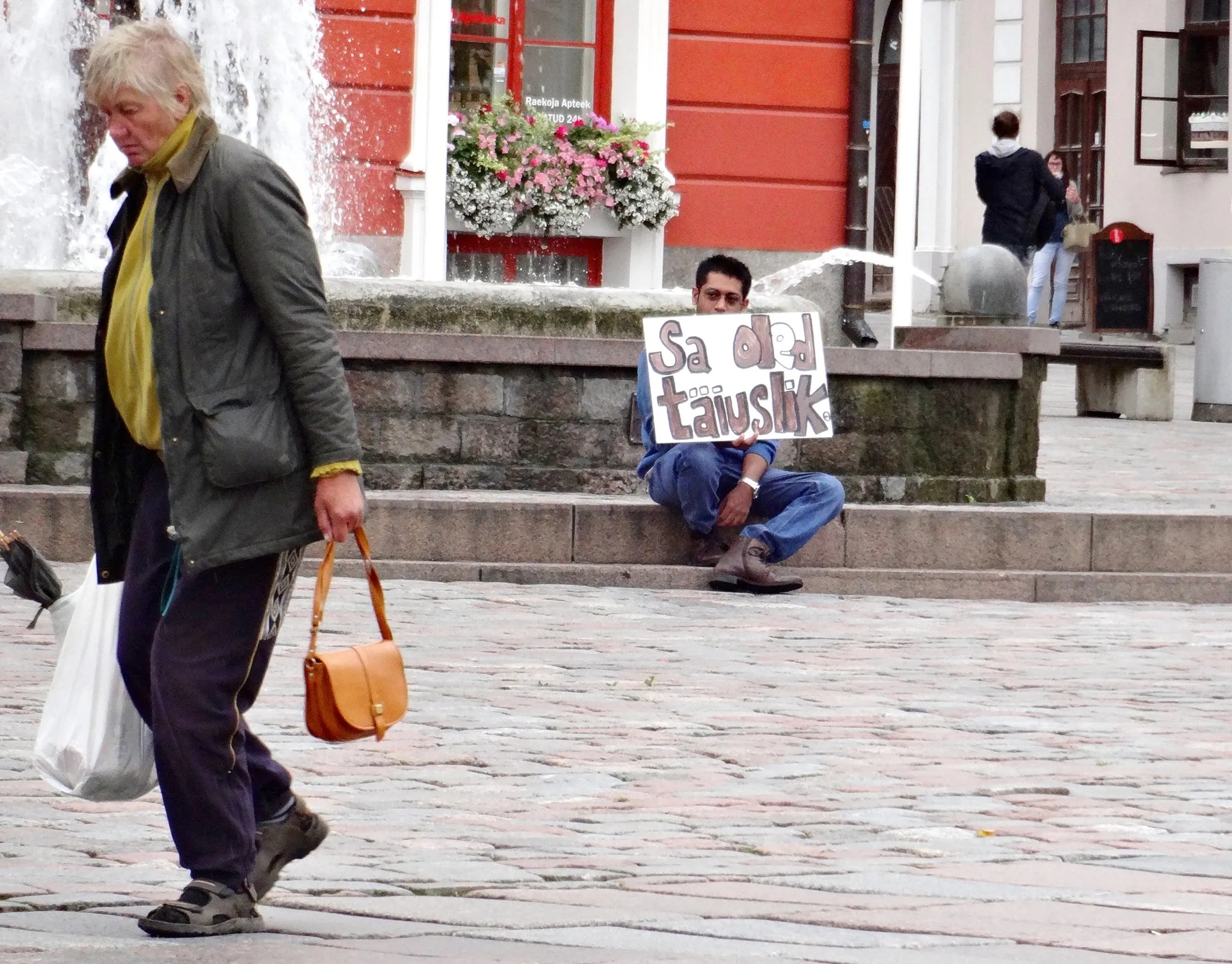 Holding up the sign in Estonia