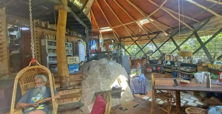 The highlight of this eco-friendly house is how the architect has retained three natural rocks found in the plot.