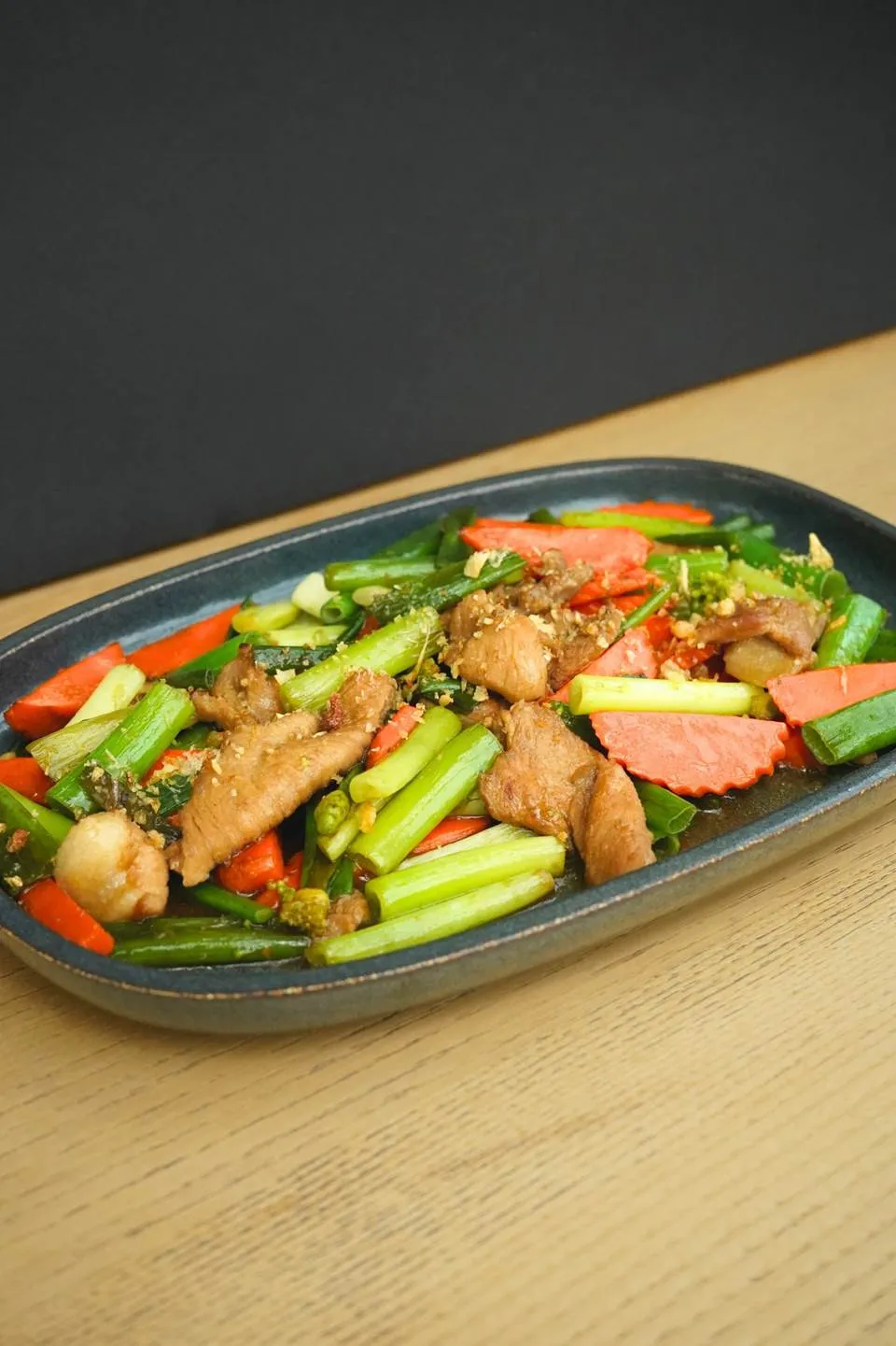 Traditional Thai Dish Blossoms with Onion Flower Stems in Bangkok