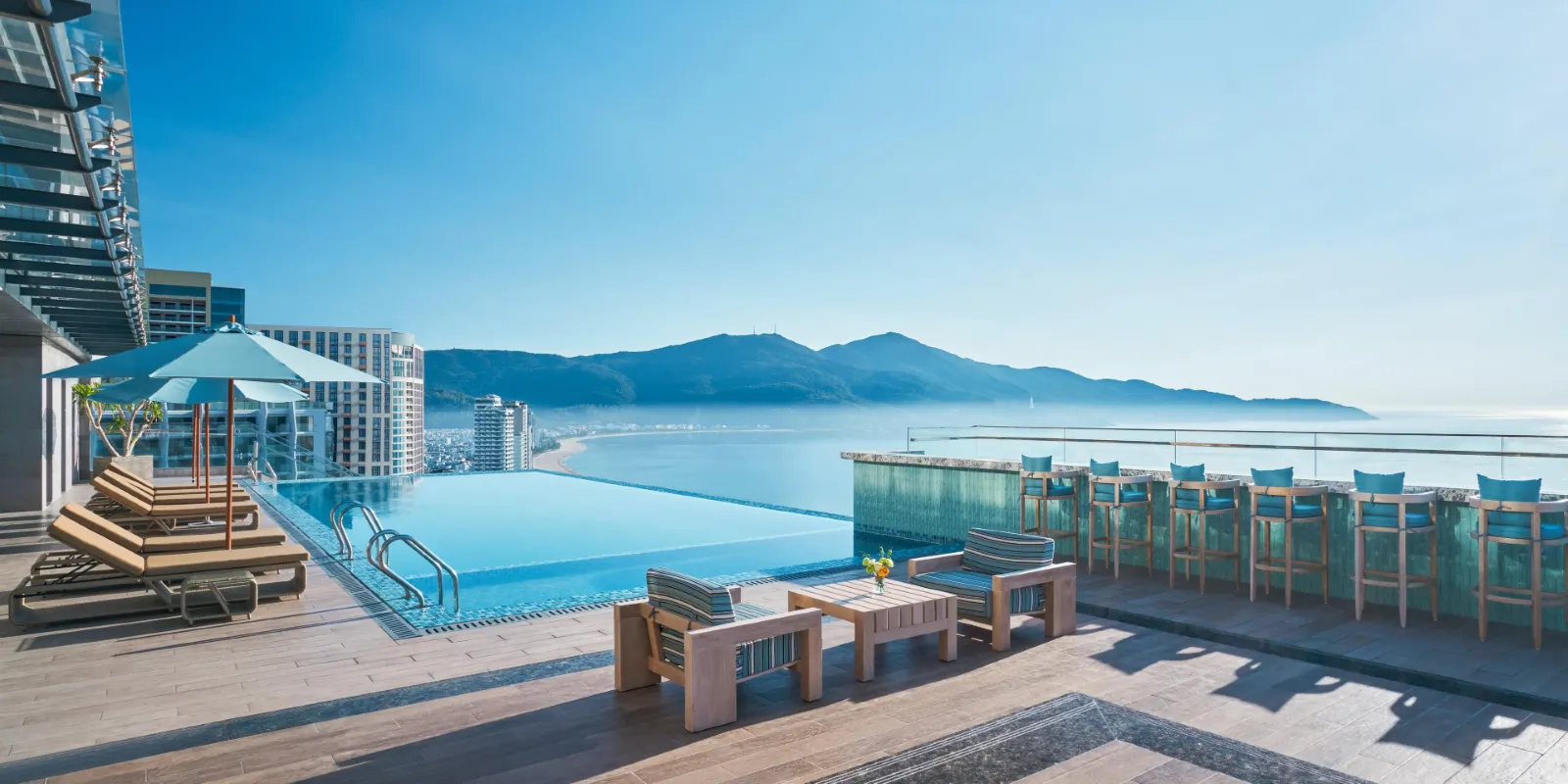 A pool with a view of the ocean

AI-generated content may be incorrect., Picture
