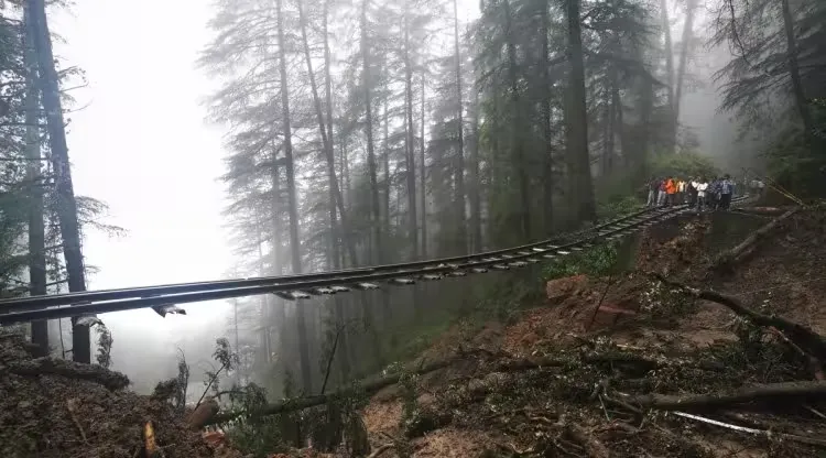A portion of the Shimla-Kalka heritage railway track that got washed away following heavy rainfall on the outskirts of Shimla, Himachal Pradesh state, Monday, Aug.14, 2023. (AP Photo)