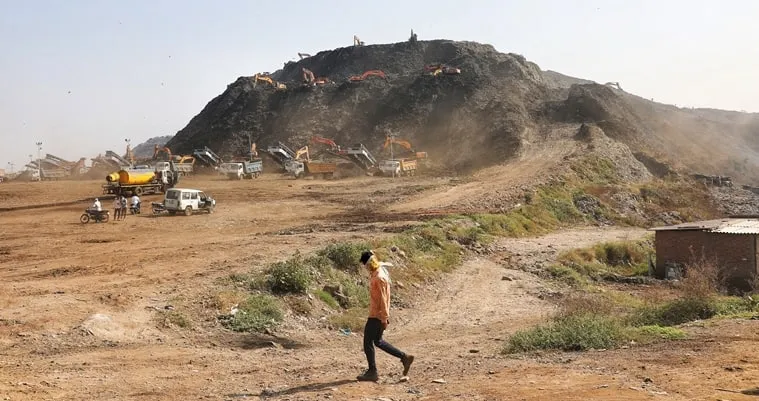 Ahmedabad landfill site, ahmedaabd garbage dump, Gujarat mounds of garbage, Mumbai-Ahmedabad Expressway, Ahmedabad Municipal Corporation, legacy waste at Pirana, garbage mounds in Ahmedabad, health hazard, indian express news