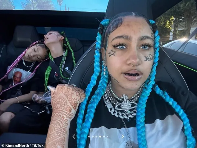 North West, 12, sparks concern as she debuts new look with fake face  tattoos and grillz | Daily Mail Online