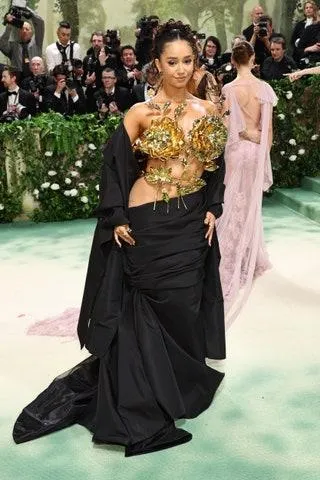 Image may contain Fashion Adult Person Wedding Accessories Glasses Bracelet Jewelry Camera and Electronics