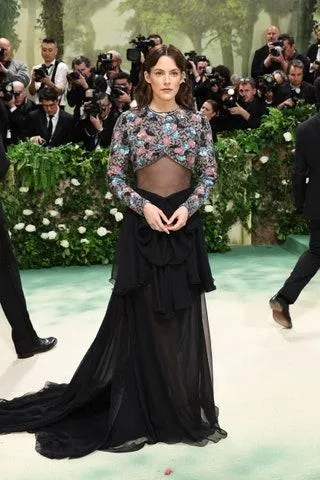 Image may contain Riley Keough Dan Gilvezan Clothing Footwear Shoe Camera Electronics Person Adult and Accessories