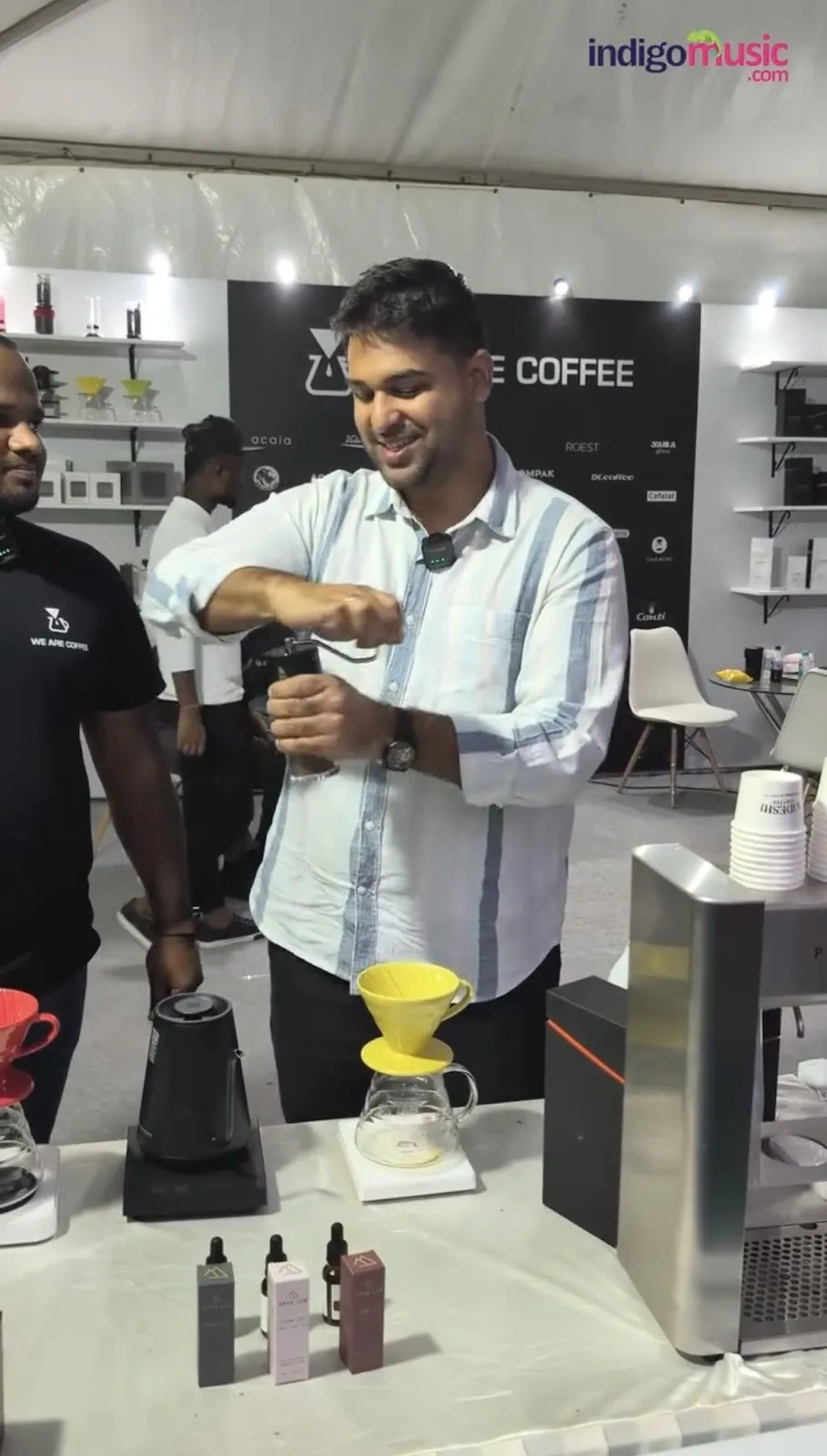 RJ Adarsh grinding the coffee beans