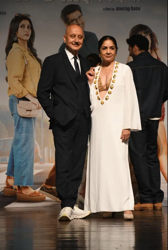 And finally, Neena Gupta looked sensational in a white dress as she posed with her on-screen partner, a dapper Anupam Kher. (Image Viral Bhayani)