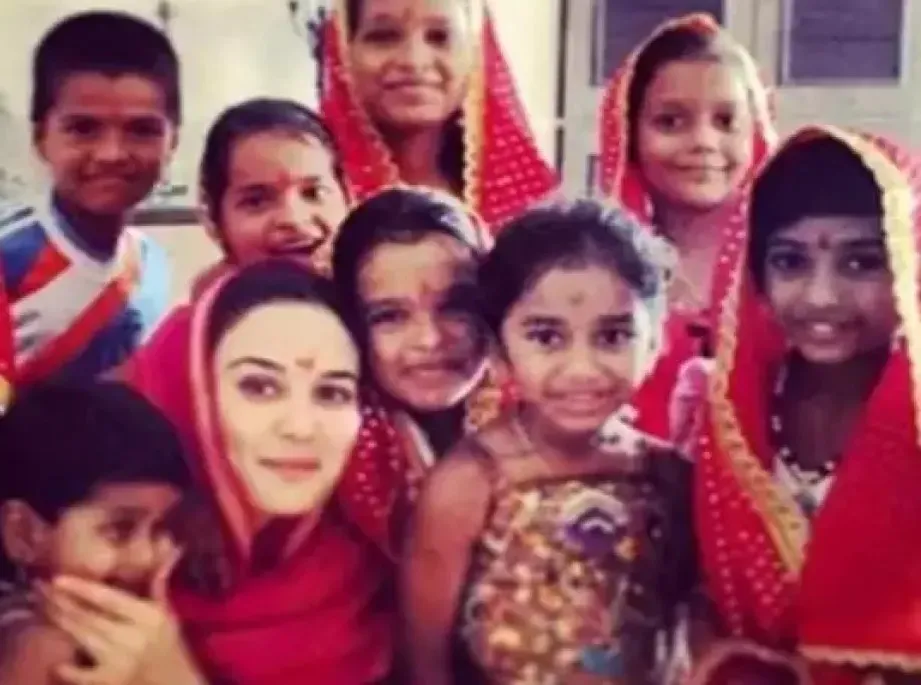 Bollywood Star Preity Zinta Embraces Motherhood with 34 Orphan Girls