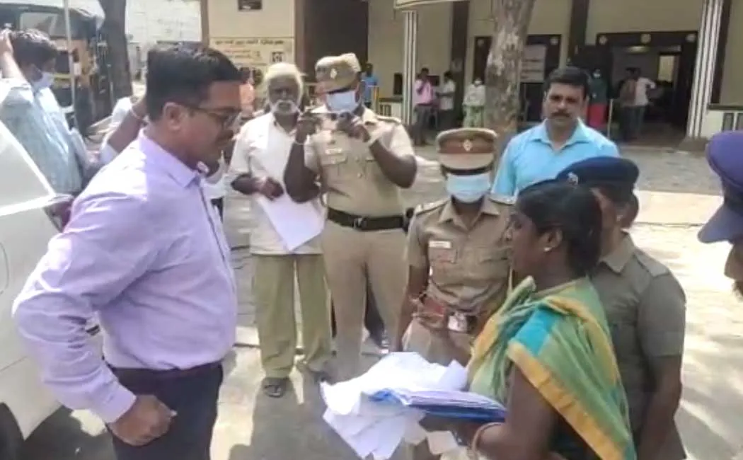 woman struggle Vellore Collectorate