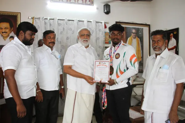 i periyasamy congratulate students placed 2nd world weightlifting  