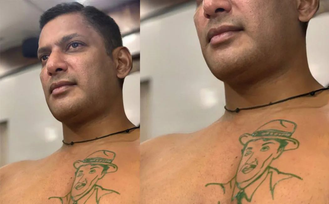 vishal tattooed late cm mgr face in his chest 