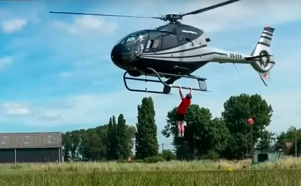 Pullups while hanging from a flying helicopter