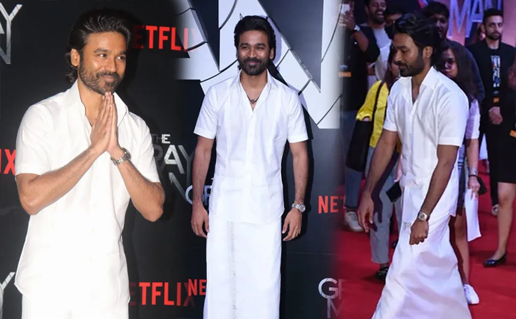 Dhanush dons traditional Veshti Netflix The Gray Man premiere Mumbai
