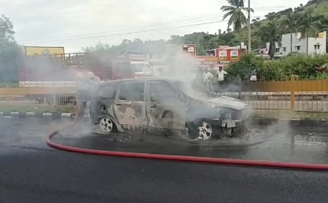 car on the national highway caught fire