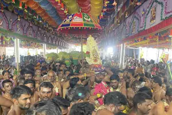 Devotees brought to the temple with knives in their chests