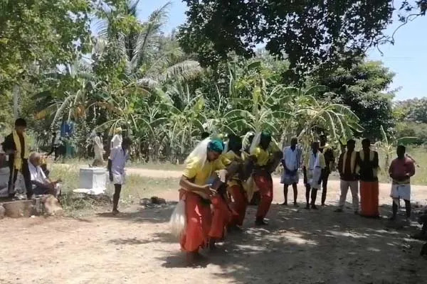 Devotees break coconuts on their heads during temple festivals