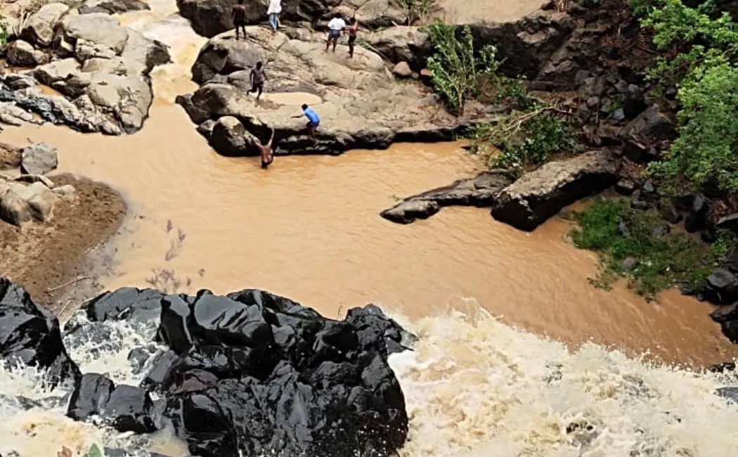 People searching in the river