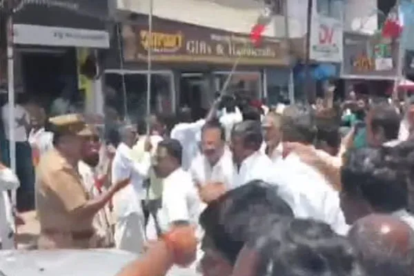 police and AIADMK pushed back when they filed their nomination papers in Utagai