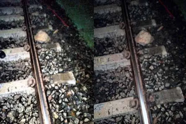 Boulders are placed on the track while the Pothigai Express train is running