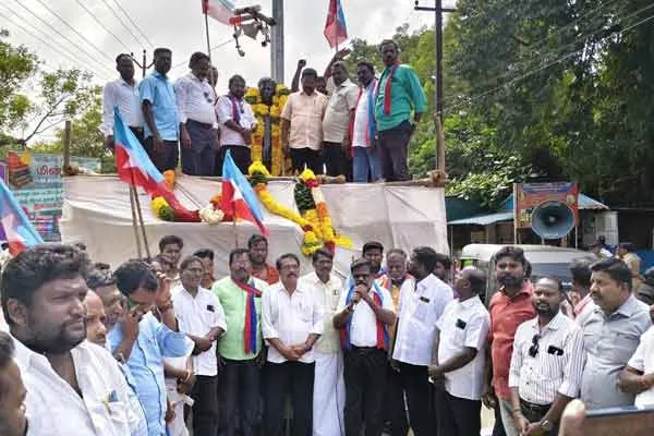 politicians  pay homage to statue of language martyr Rajendran 