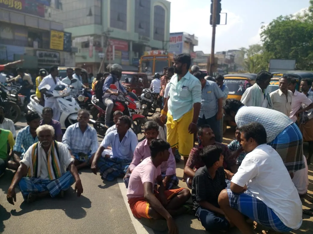  Trying to grab temple assets: Nine community people block road