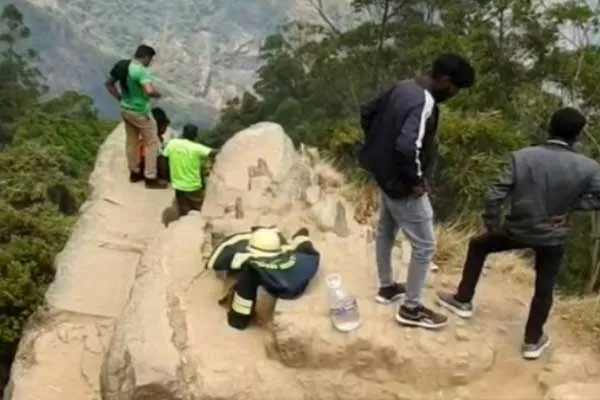 young man trapped in a 100-foot ditch in Kodaikanal in the style of the film 'Manjummel Boys'