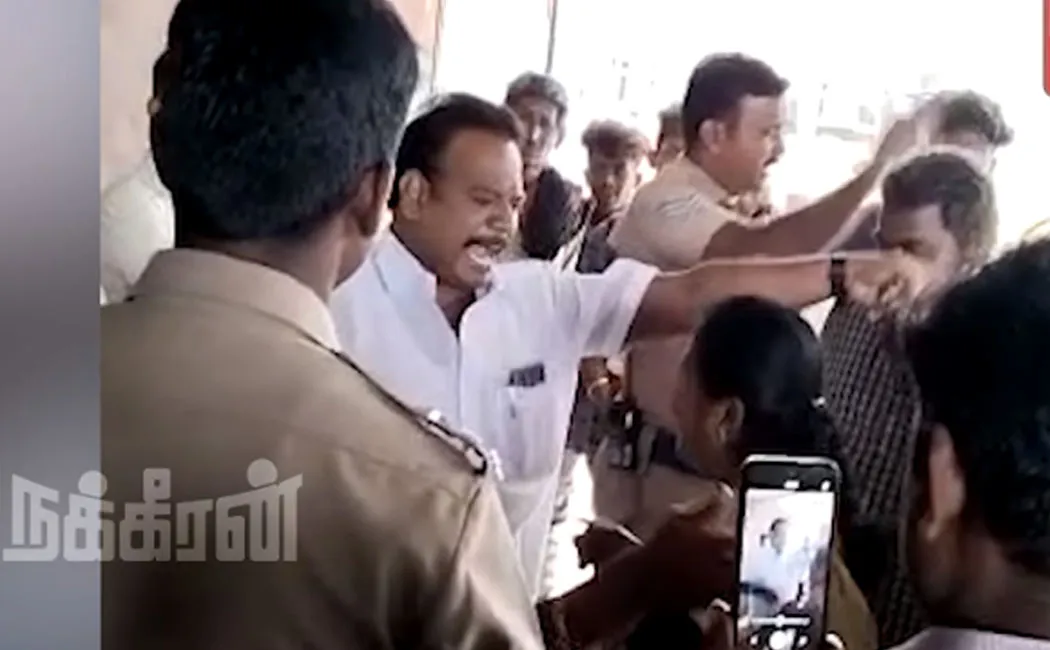 DMK member who threatened government officials sivaganga 