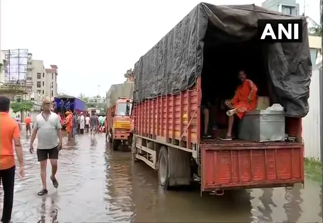 Gujarat police constable carried two children on his shoulders for over 1.5 km in flood waters