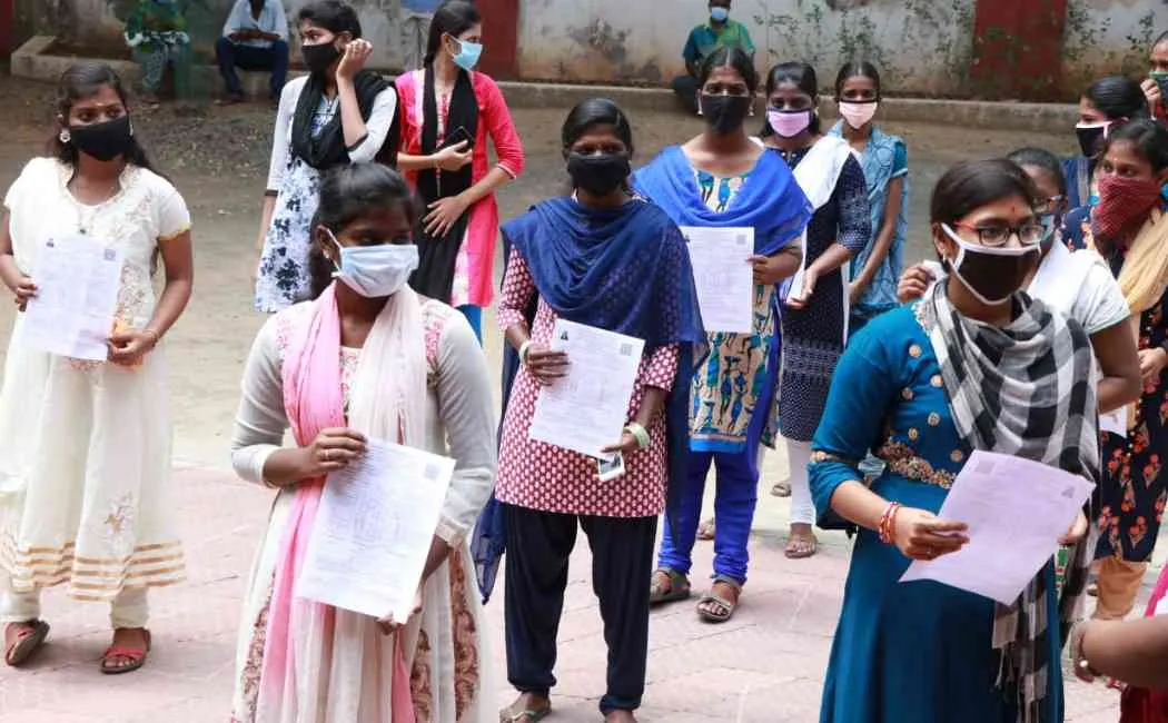12th students receiving temproray marksheet