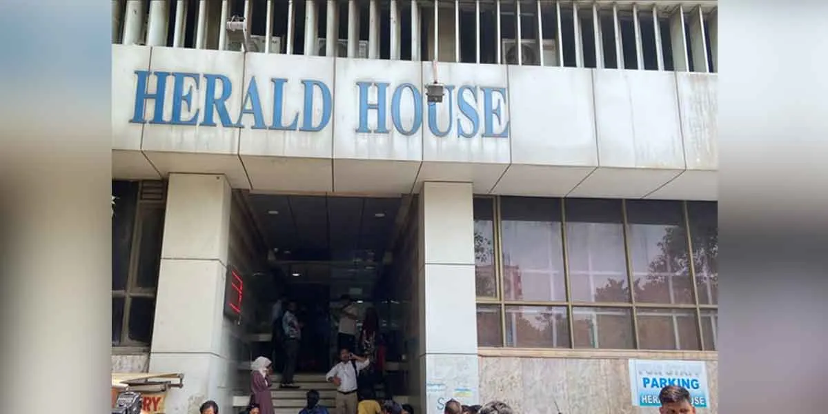 National Herald press office seal!