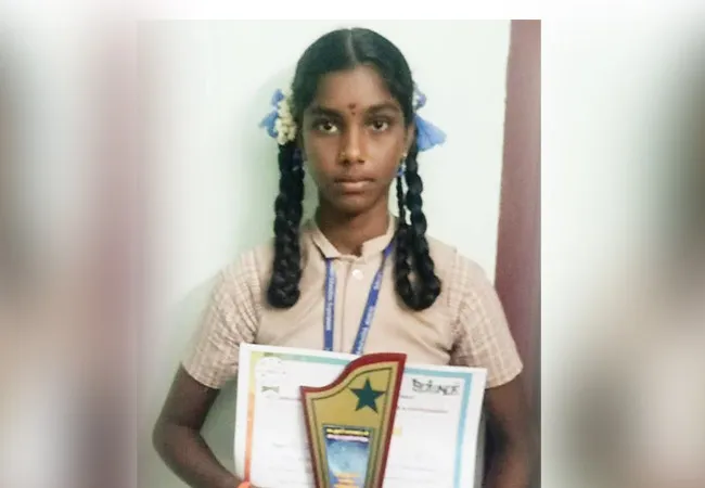 CUDDALORE SCIENCE EXHIBITION COMPETITION GOVT SCHOOL STUDENT NISHA SECOND PRIZE 