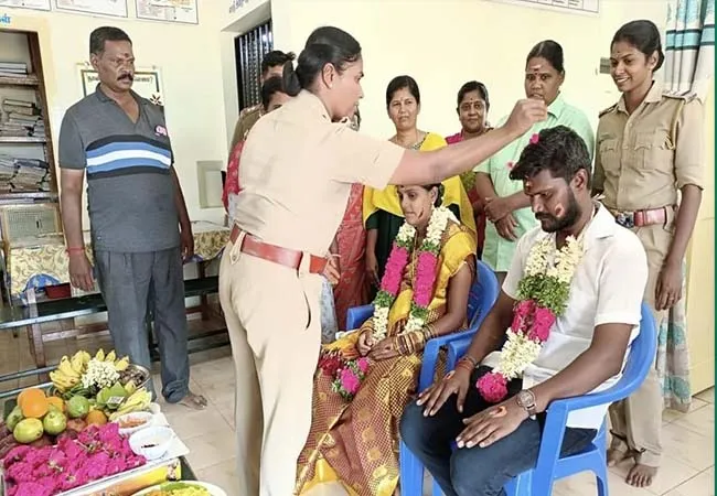 A baby shower for a female police officer at the police station...a loving couple!