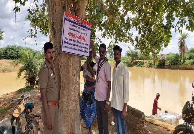 Children drowning in ponds next   Cops with risk banner POLICE AWARENESS 