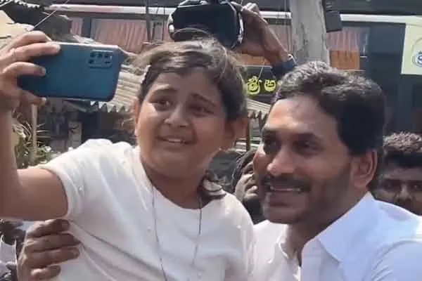 Jagan Mohan Reddy lovingly embracing a crying girl 