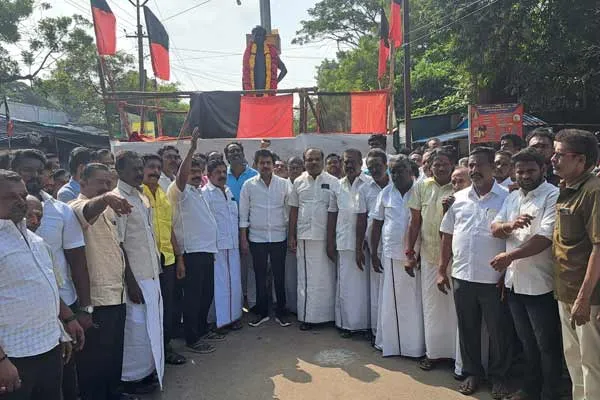 Political parties paid tribute to the statue of language war martyr Rajendran