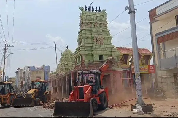 Officials demolish the temple as per the court order