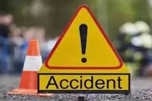 Two-wheeler collision on a four-lane road