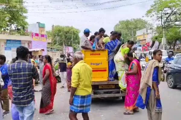 Corporation employees who brought people in a garbage truck to give biryani