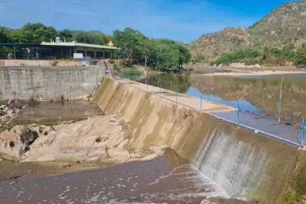 Pugalur barrage across the river was full