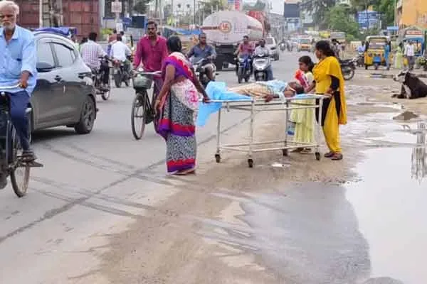 Government hospital patients crossing the road with danger