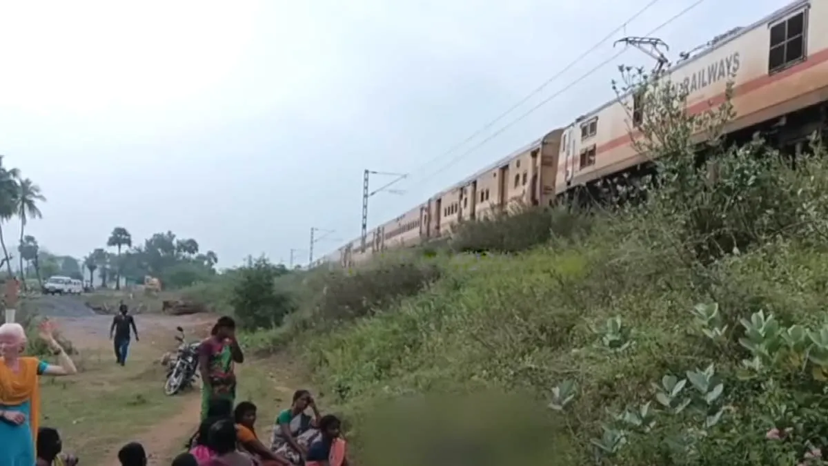 School students trying to cross while playing games on cell phones; Train collision accident