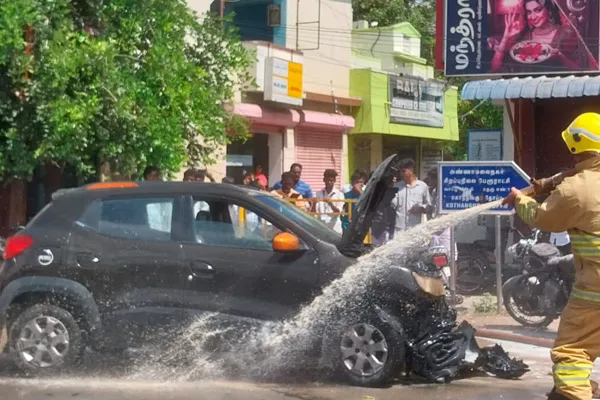 A car on the road caught fire